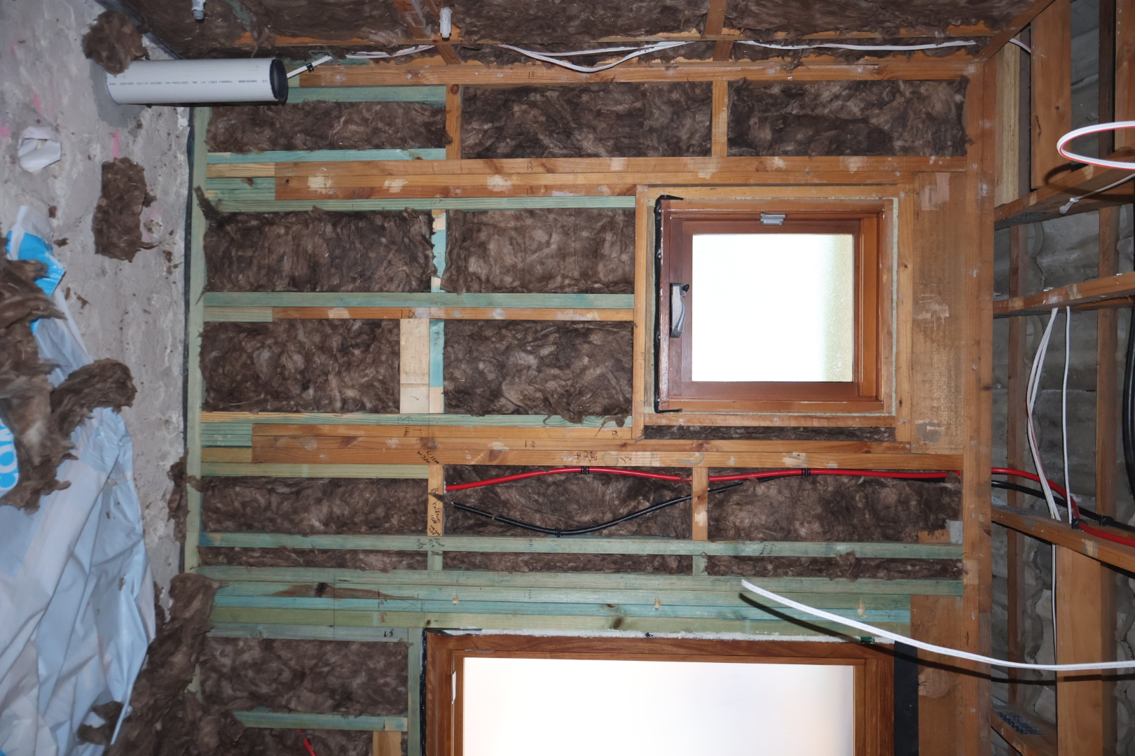 Wall insulation fitted around windows, NSW